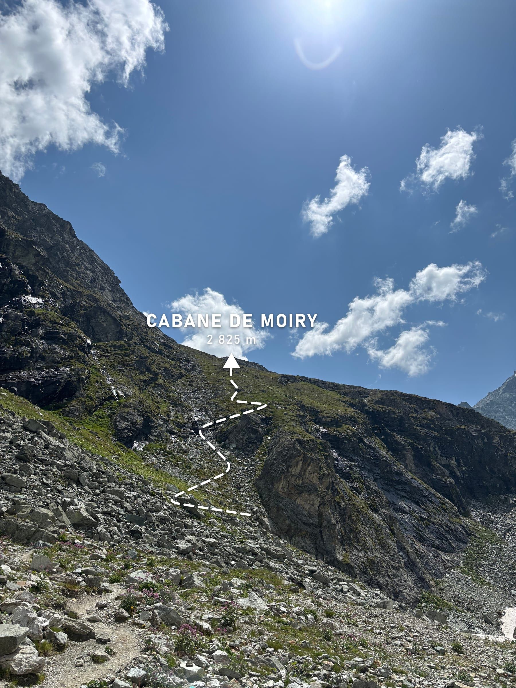 Rocky trail to the Moiry hut, with the switchbacks drawn as a white dotted line up to the hut at 2,825 m